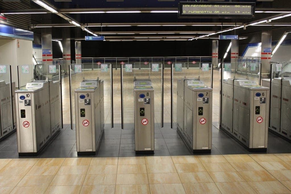 Card-operated entry gates at a building entrance